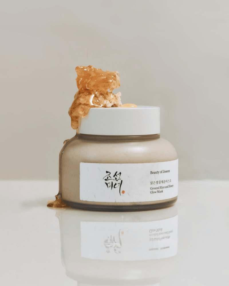 Beauty of Joseon Ground Rice and Honey Glow Mask jar with honey dripping, promoting radiant and hydrated skin.