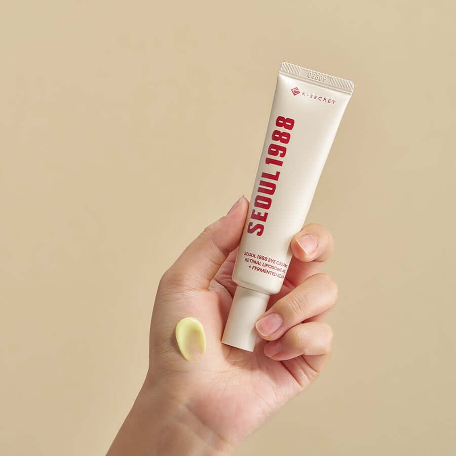 KSECRET SEOUL 1988 Eye Cream in hand, showcasing cream texture, anti-aging skincare product with retinal liposome.