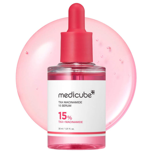 Medicube TXA Niacinamide 15 Serum in a dropper bottle with pink background, enhancing skin glow and tone.