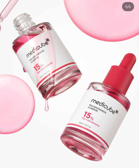 Medicube TXA Niacinamide 15% Serum in pink packaging, designed for brightening and hydrating the skin.